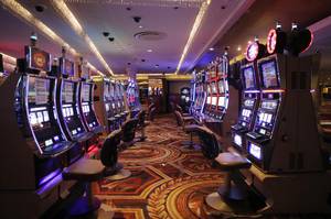Chairs have been removed at some slot machines to promote social distancing at Caesars Palace.