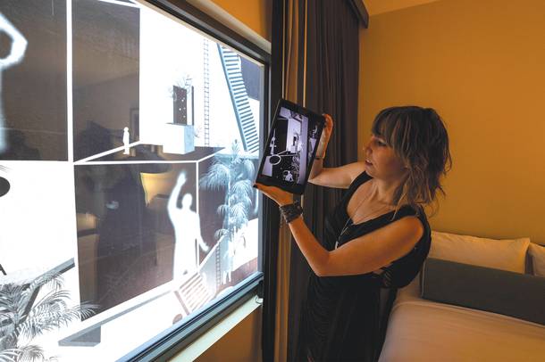 Artist Camila Magrane demonstrates her augmented reality experience “Transmigrations.”