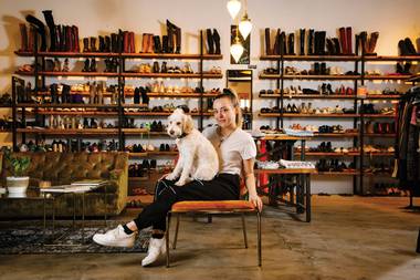 Alt Rebel owner Taylor Rice, inside her boutique with her dog Charlie