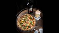 Delicious, hot, expertly crafted pizza. The Little Red Rooster pie is a staff and fan favorite, featuring a sauceless base with chicken, tomatoes and jalapeños. It’s the perfectly spicy companion to a Slane Sour.