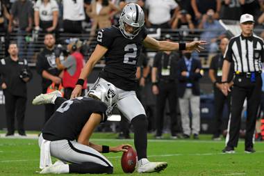 Las Vegas’ Daniel Carlson kicks the winning field goal in the Raiders’ 31-28 overtime win against Miami on September&nbsp;26.