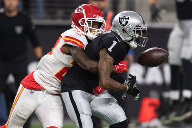 Chiefs cornerback Rashad Fenton strips the ball from Raiders wide receiver DeSean Jackson November 14 at Allegiant&nbsp;Stadium.