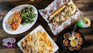 The sandwich selection goes on forever, from roast pork to warm or chilled lobster rolls, while the Ultimate Tailgate Burger drops a crabcake atop a thick beef patty with melty American cheese.