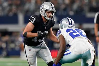 Raiders receiver Hunter Renfrow (13) runs a pass route against Jourdan Lewis during a Thanksgiving Day game against the&nbsp;Cowboys.