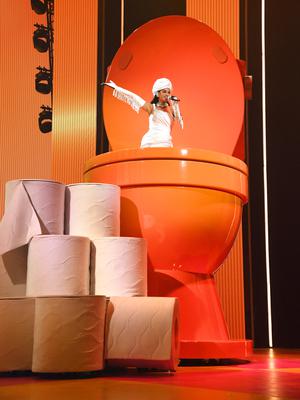 Katy Perry emerges from a huge toilet onstage at Resorts World Theatre on December 29.