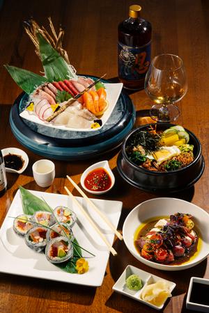 Chef’s sashimi platter, bluefin tuna caprese, Yu-Or-Mi Roll and chicken stone rice bowl at Yu-Or-Mi