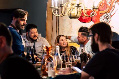 Other Mama general manager Allen Holmes, second from left, chats with&nbsp;patrons.