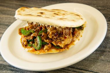 Start with the cumin lamb burger, a craveable twist on the traditional paomo, lamb stew with chunks of steamed flatbread.