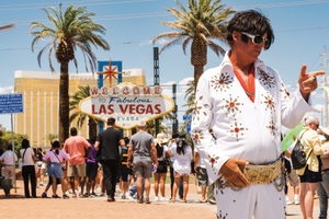 An Elvis busker at the 'Welcome to Fabulous Las Vegas sign