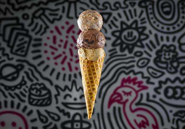 ON THE CONE: Churros and fudge, triple chocolate chunk brownie and coffee and doughnuts ice cream scoops (Wade Vandervort / Staff)