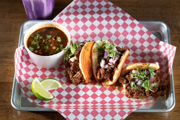 Birria bao with consomme