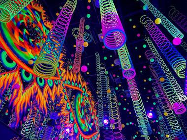 At “Wink World: Portals Into the Infinite,” guests journey through six infinity mirror rooms; each containing a distinct combination of light, color, sound, and motion.