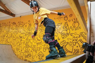 On February 3, nearly 30 quad and in-line skaters took laps across and performed tricks above the shop’s 16-by-42-foot indoor ramp, newly renovated with a spine and a hump.