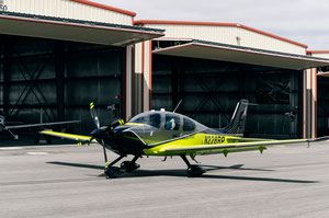 A pilot in a Cirrus SR22 at All In Aviation