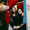 Victoria Hogan and Stephen Fetterusso inside one of their vintage photo booths.