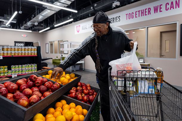 Ed Nairn, 82, shops for groceries