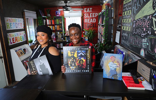 Owners Charlie, left, and Rochelle Luster pose in the Analog Dope Bookstore, 205 E. Colorado Ave., in the Arts District Thursday, March 7, 2024. The book selection features genres such as Activism, Socio-Political, Spirituality, Artistry, Business, Young Adult and Children's books centered in Black Culture, African Diaspora, and People of Color. They sell records too.