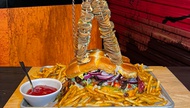 Area15’s The Beast eatery is serving up a Godzilla-sized burger that’s free if you finish it and costs $88 if you don’t. 