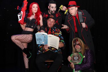 Douglas “Lefty” Leferovich in the center surrounded by the cast of “Late Night Magic”—clockwise from left: Hollie England, John Shaw, Bizzaro and The Shocker. 