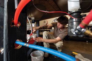 Deacon Perryman, 19, works in the plumbing technician training lab at National Technical Institute in Henderson.