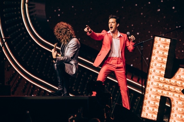 Under sprays of confetti and glitzy signage shaped in the image of the Welcome to Fabulous Las Vegas sign, The Killers barreled through the most popular Hot Fuss track, commemorating night two of its sold-out residency, a historic occasion for the Vegas-bred band that started as a group of unknowns in 2001.