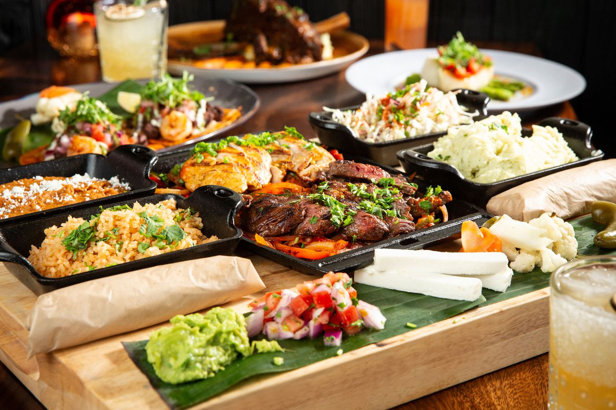 Filling the long-empty space that once housed Miller’s Ale House, Flecha seems like an ideal place to serve margaritas and cocktails made with Wahlberg’s Flecha Azul tequila.