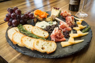 The meat is where you begin—start with a classic salami variety, or add a dry-cured pork like prosciutto or ham.