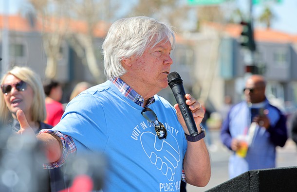 Clark County Commissioner Tick Segerblom speaks before the start of the second annual Peace Walk and Super Saturday Family Fun Festival at Cashman Park Saturday, March 15, 2025. The event aims to foster unity, provide resources, and create positive community engagement in the Pennwood/Arville area.