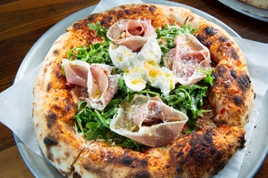 The A.P.B., stacked with arugula, prosciutto and burrata.