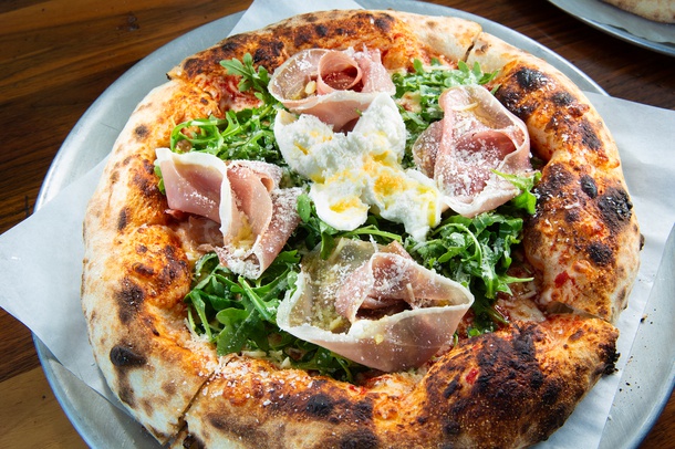 The A.P.B., stacked with arugula, prosciutto and burrata.