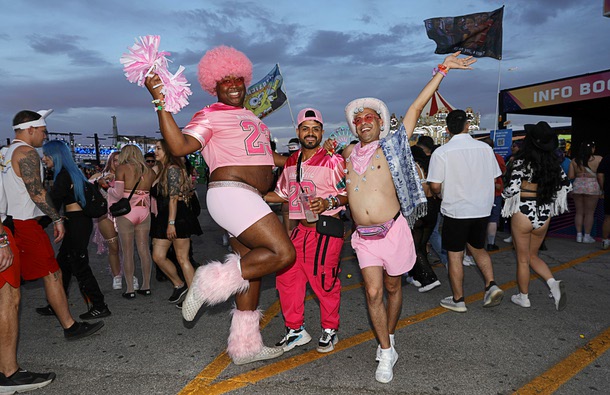 Alex Jones, left, Orlando Luna, center, and Anastacio Vargas, of Nashville, pose during the first night of 2025 EDC at the Las Vegas Motor Speedway Friday, May 16, 2025.