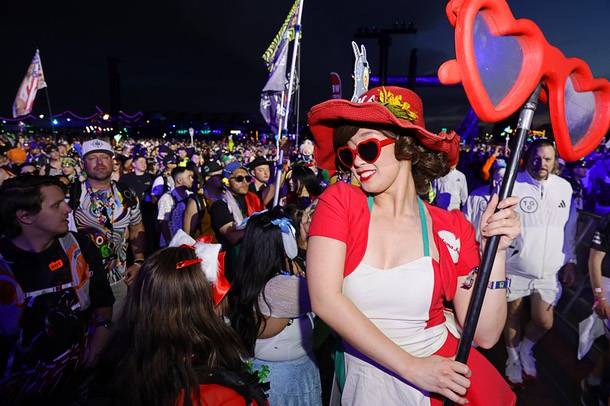 A performer interacts with festivalgoers in Kinetic Field during the first night of 2025 EDC at the Las Vegas Motor Speedway Friday, May 16, 2025.