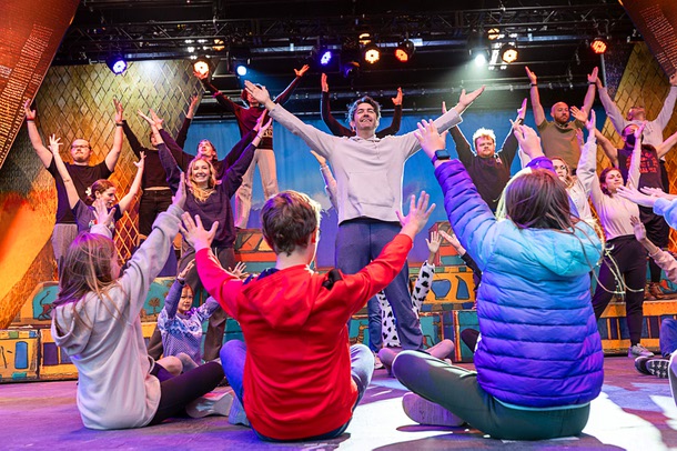 Cast members, including Max Baker (Joseph), center, perform during a rehearsal of“Joseph and the Amazing Technicolor Dreamcoat” at Spring Mountain Ranch State Park Saturday, May 17, 2025. The production will open on May 28.