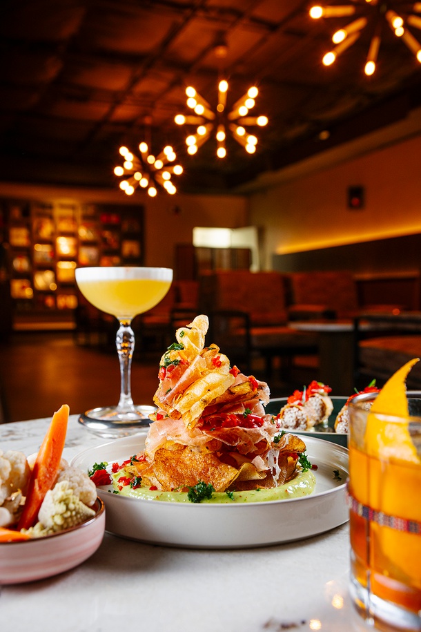 Nocturno’s prosciutto tower, spicy tuna, house pickles, Pisco Sour and Old Fashioned.