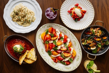 Chef Fabio Viviani’s famous Wagyu meatball, bottom right, flanked by an assortment of new dishes and drinks at Ai&nbsp;Pazzi.