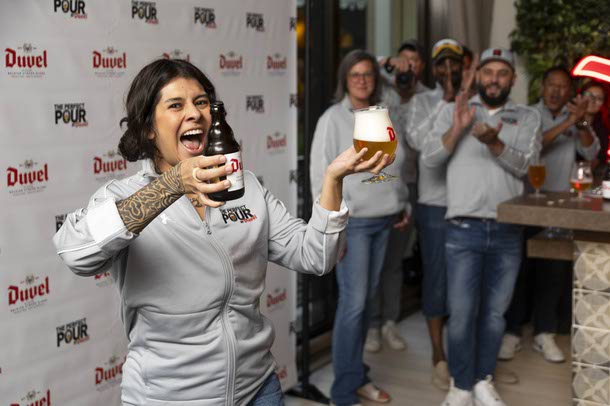 Cindy Juarez, bartender at Silver Stamp, reacts after pouring a Duvel Belgian Golden Ale during the 4th annual The Perfect Pour by Duvel contest at Wynn, Thursday, Aug. 7, 2025.
