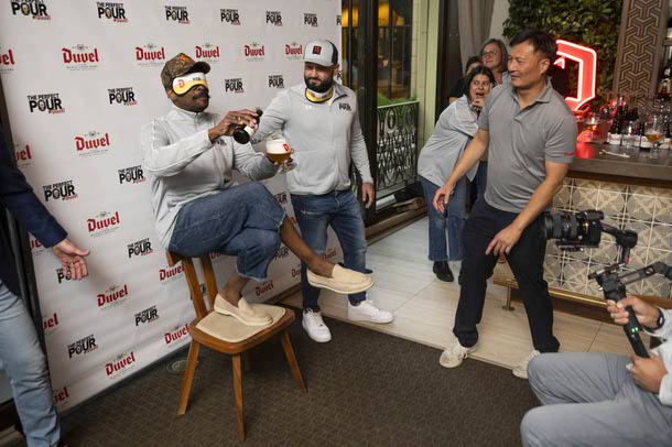 Kiel Moton, bartender at Charlie's Bar & Kitchen in Bronx, NY, pours a Duvel Belgian Golden Ale while blindfolded during the 4th annual The Perfect Pour by Duvel contest at Wynn, Thursday, Aug. 7, 2025. 