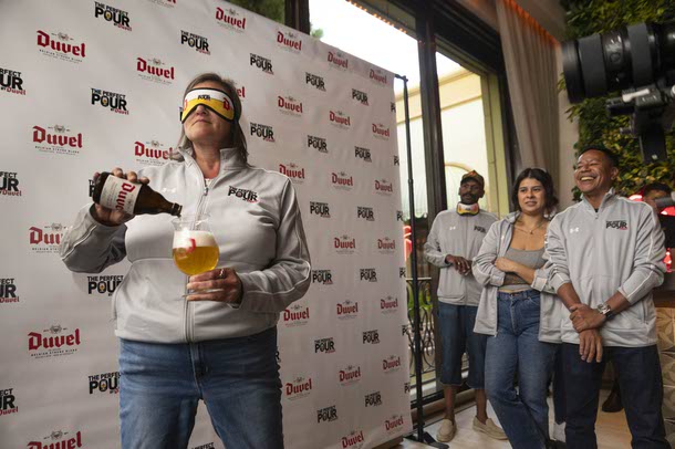 Cheryl Milner, bartender from Monks Pub in Chicago, IL, pours a Duvel Belgian Golden Ale during the 4th annual The Perfect Pour by Duvel contest at Wynn, Thursday, Aug. 7, 2025. Milner won the competition.