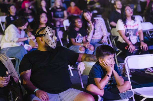 Attendees watch a performance by Los Carajos during the Nightmare in Vegas horror convention at the Silverton, Saturday, Oct. 4, 2025.