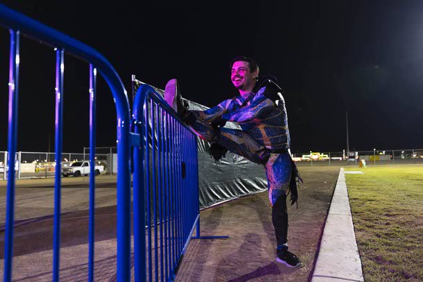 El Lalito stretches before a performance during the Las Vegas PRIDE festival at Desert Breeze Events Center, Saturday, Oct. 18, 2025.