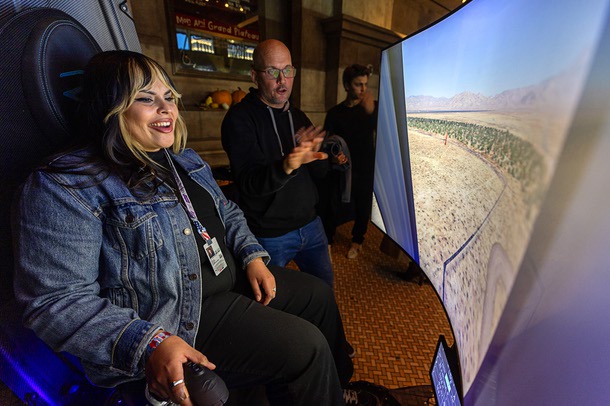 Las Vegas Weekly reporter Gabby Rodriguez tries a Zapata Airscooter flight simulator during a news conference at Mon Ami Gabi restaurant in Paris Las Vegas Friday, Nov. 21, 2025.