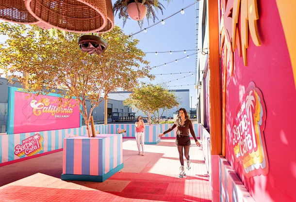 Keely O’Neal, senior project manager for Bucket Listers, skates in the Malibu Barbie Cafe at Area 15 Wednesday, Dec. 17, 2025.