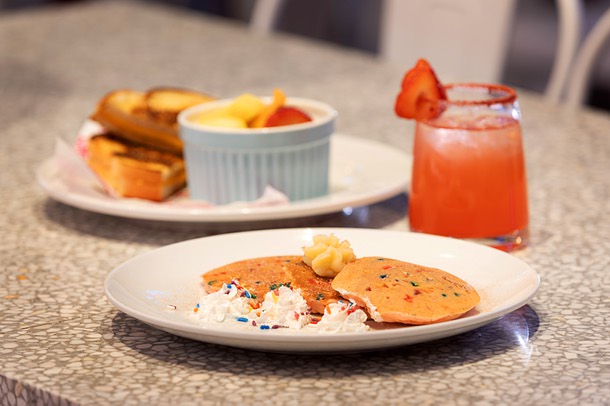 Kid’s Rainbow pancakes are displayed in the Malibu Barbie Cafe at Area 15 Wednesday, Dec. 17, 2025.