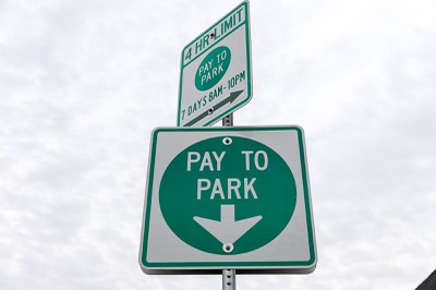 A view of a pay-for-parking sign in the Arts District Tuesday, Dec. 30, 2025.