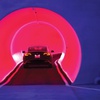 A Tesla drives through a tunnel in the Vegas Loop to the Las Vegas Convention Center. 