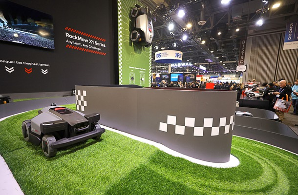 A RockMow X1 series robotic lawn mower by Roborock travels on a course during CES 2026 at the Venetian Expo Wednesday Jan. 7, 2026.