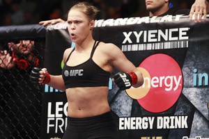 Ronda Rousey limbers up before her fight with Sara McMann at UFC 170 on February 22, 2014 at Mandalay Bay.