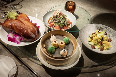 The kitchen doors seem to never stop swinging with waitstaff going in and out, fetching a vast array of savory bites and wok-fired delicacies.