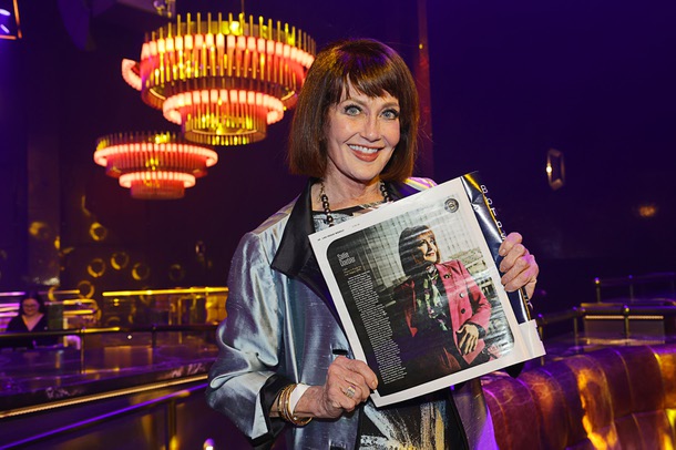 Honoree Sallie Doebler, CEO for Las Vegas Mayor’s Fund for Las Vegas LIFE, poses with a copy of Las Vegas Weekly during the C-Suite Honors event in the Zouk Nightclub at Resorts World Wednesday, Feb. 25, 2026.