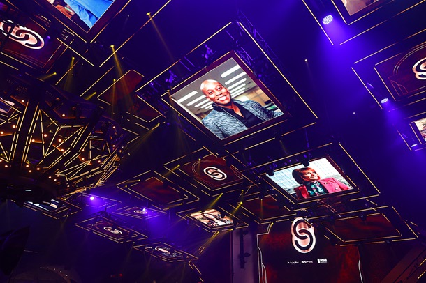 Photos of honorees Uri Clinton, top, executive vice president, general consul and corporate secretary for Boyd Gaming, and Sallie Doebler, CEO for Las Vegas Mayor’s Fund for Las Vegas LIFE, are displayed before the C-Suite Honors event in the Zouk Nightclub at Resorts World Wednesday, Feb. 25, 2026.